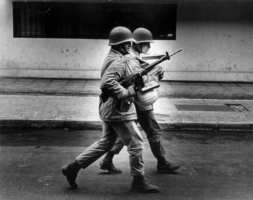 Chili, Santiago, september 1973. Several days after the military coup. Soldiers are carrying books and papers to be burned later on.
