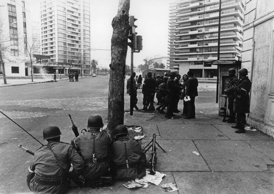 Chili, Santiago, september 1973. Soldiers are patrolling and searching people on the streets of Santiago.