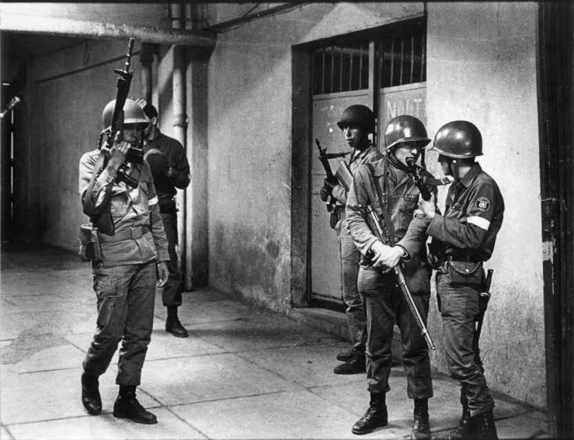 Chili, Santiago, september 1973. Soldiers at the football stadion where prisoners are being held.
 