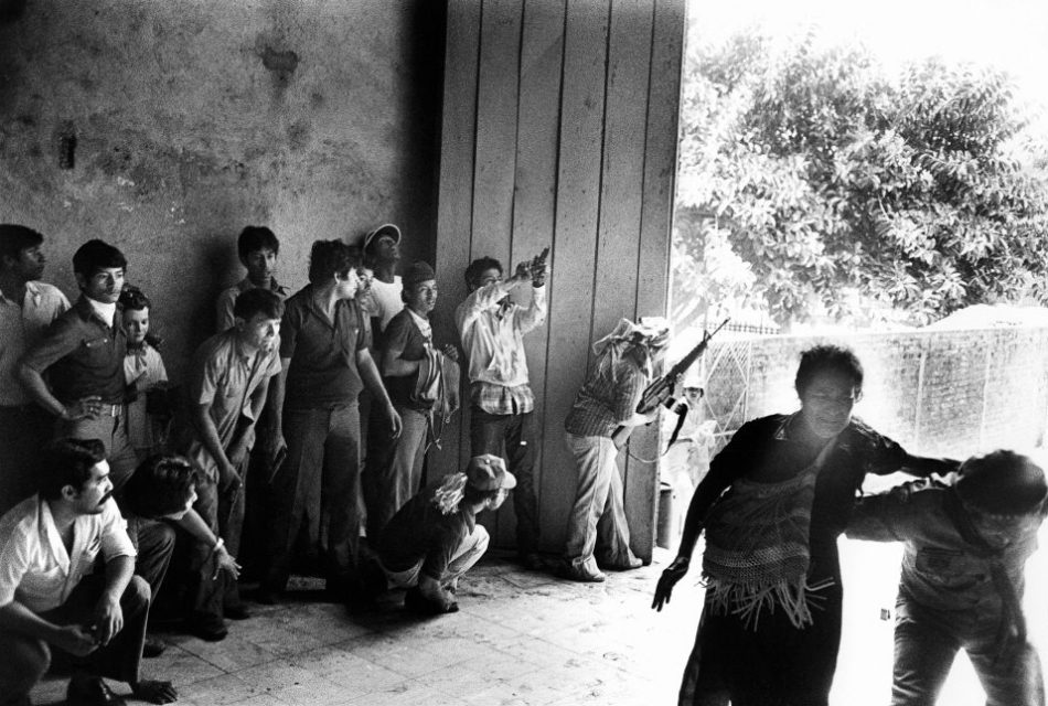 El Salvador, San Salvador, 1980. During the funeral of archbishop Romero snipers open fire at the mourning crowd. 