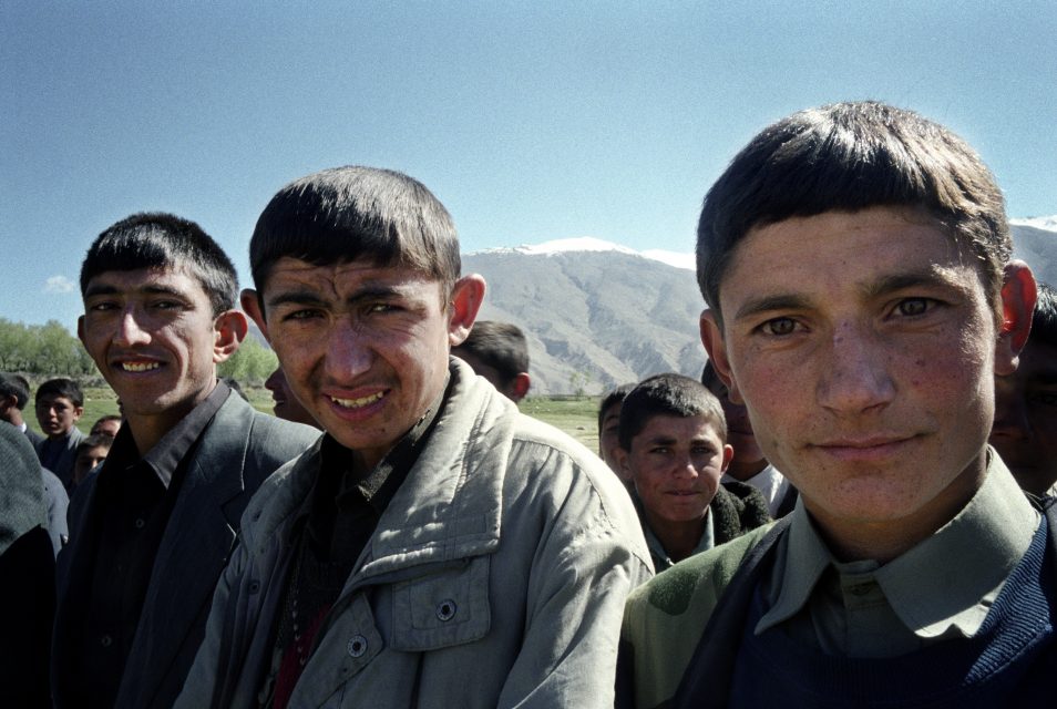 ISHKASHEM, BADAKSHAN, AFGHANISTAN: JUNE 2004: School children standing in line for the festivities for 