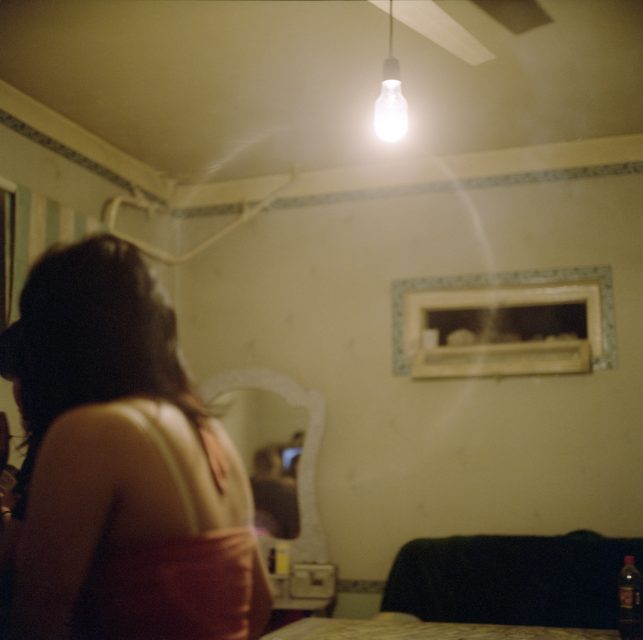OSH, 2009. An Uzbek girl working as a prostitute in Jetigen Sauna. 