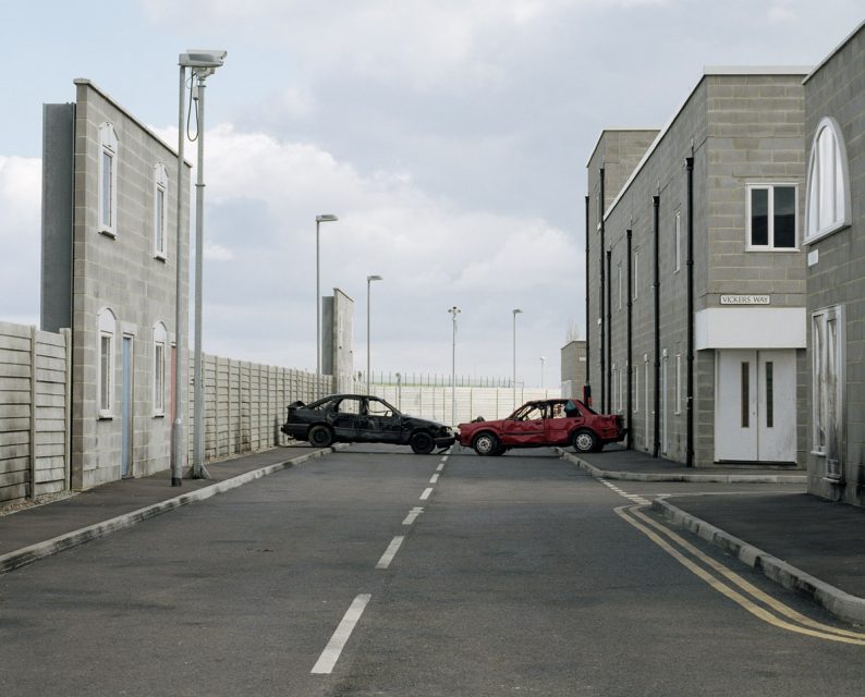 Road Block River Way from the series Public Order (2003-2005). In this photo series, Sarah Pickering documented a model city which is used by the English police. 
