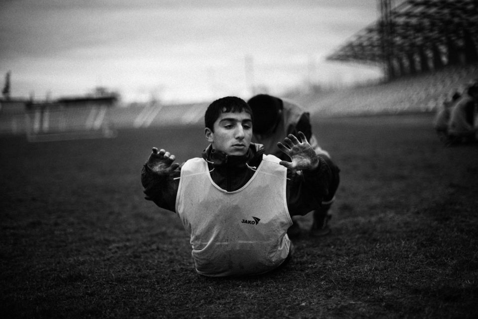 Training of the 15/16 age group of Lernayin Artsakh (Karabakh Stepanakert) inside the Stepanakert stadium. From the series: Offside - Football in Exile 