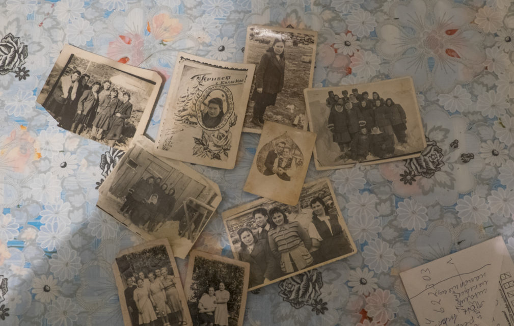 Photographs on the kitchen table of Antonia Novosad. On one of the postcards is written ‘privet c Kolymy’ which means ‘greetings from Kolyma’. 